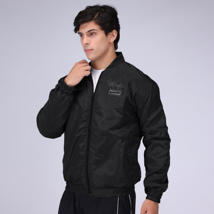 Black bomber jacket for men, modern and sleek design.