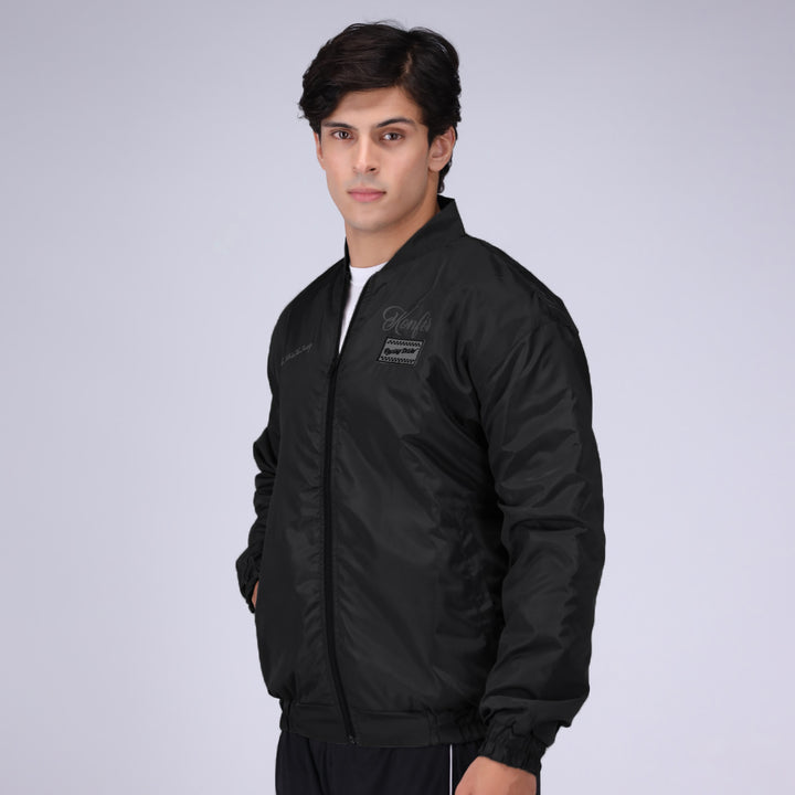 Black bomber jacket for men, modern and sleek design.
