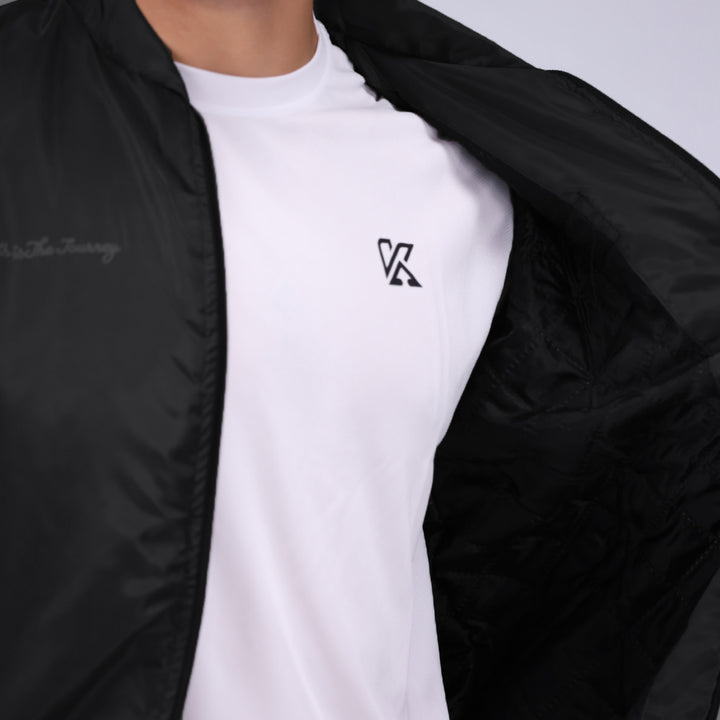 Black bomber jacket for men, modern and sleek design.