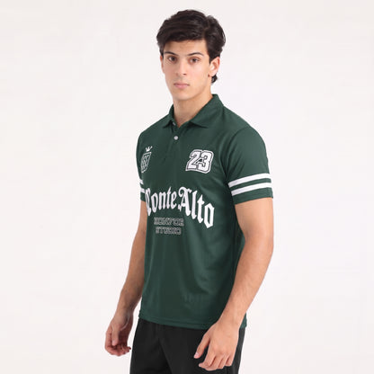 Man wearing a green polo shirt with 'Monte Alto' branding on a white background
