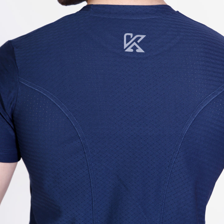 Navy blue athletic shirt with a logo on the back against a white background