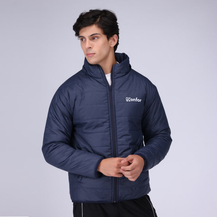Togs blue puffer jacket for men, insulated and stylish winter wear.