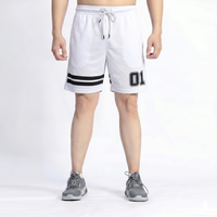 White shorts with black stripes and numbers on a white background